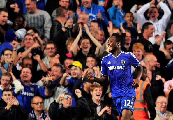 John Mikel Obi celebrates after scoring his team's second goal during the English Premier League football match between Chelsea and Fulham at Stamford Bridge in London on September 21, 2013. (Getty Images)